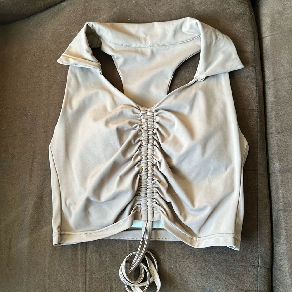 Light brown V neck shirt